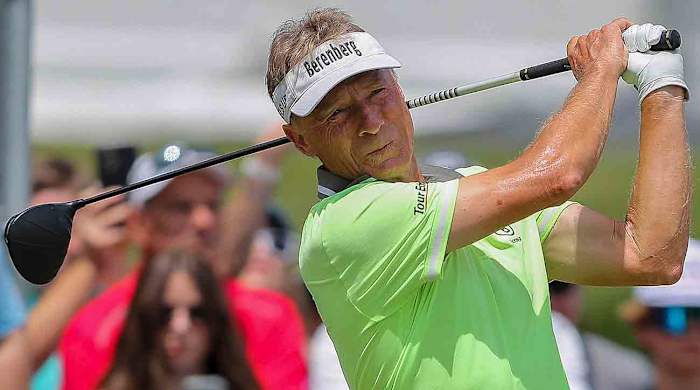 Bernhard Langer watches a drive at the 2023 U.S. Senior Open.